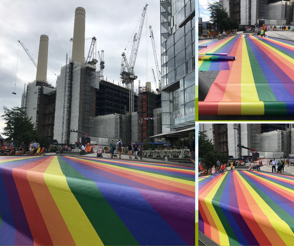 Pride rainbow floor graphics in front of Battersea Power Station